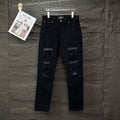 AMIRI Mesh‑Lined Multi‑Rip Distressed Slim‑Fit Denim Jeans