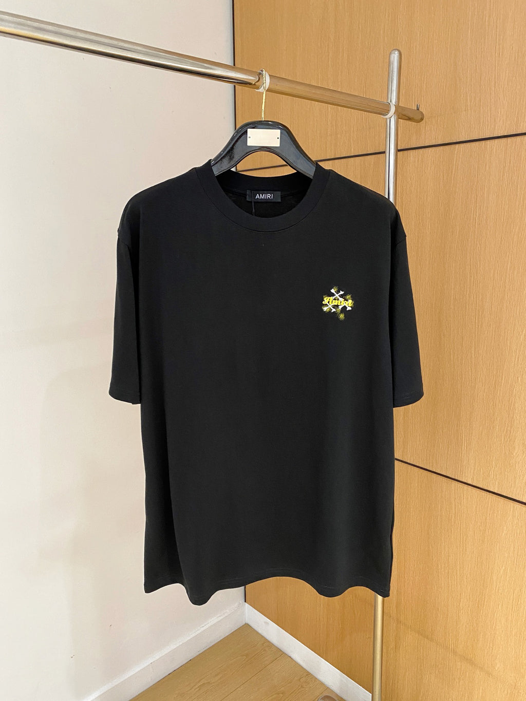 AMIRI Skull Crossbones Chest Graphic Crew Neck Short‑Sleeve T‑Shirt