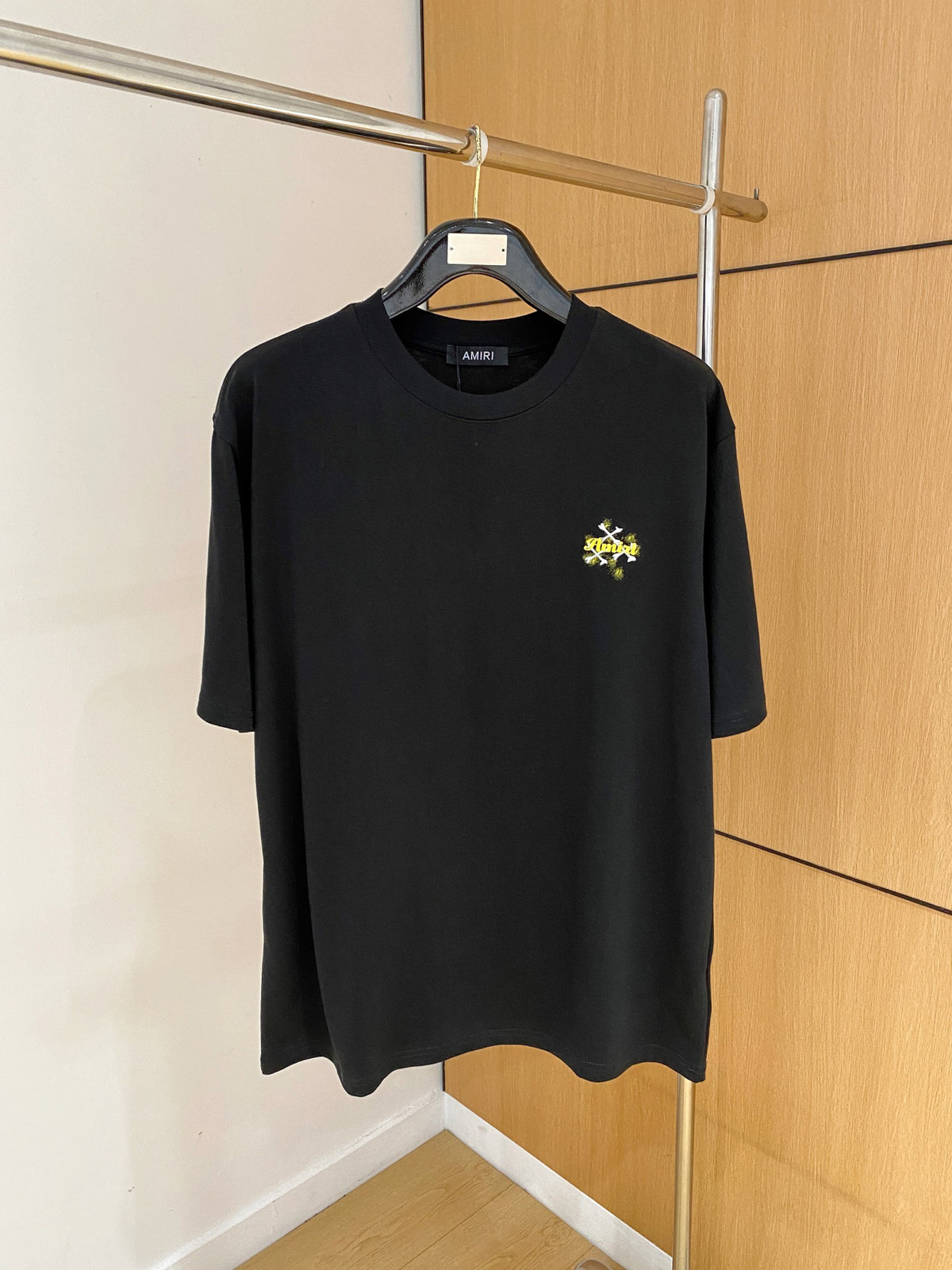 AMIRI Skull Crossbones Chest Graphic Crew Neck Short‑Sleeve T‑Shirt