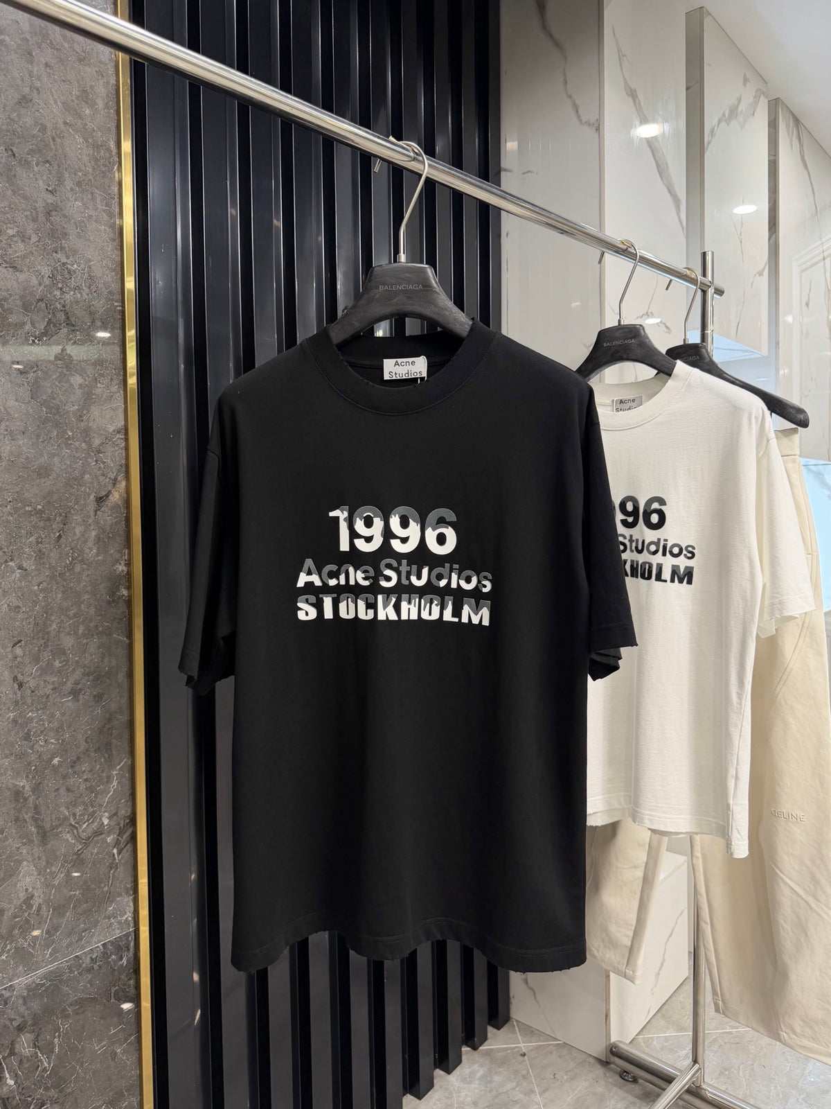 Acne Studios Stockholm 1996 Stacked‑Text Distressed‑Hem Oversized Crew‑Neck T‑Shirt