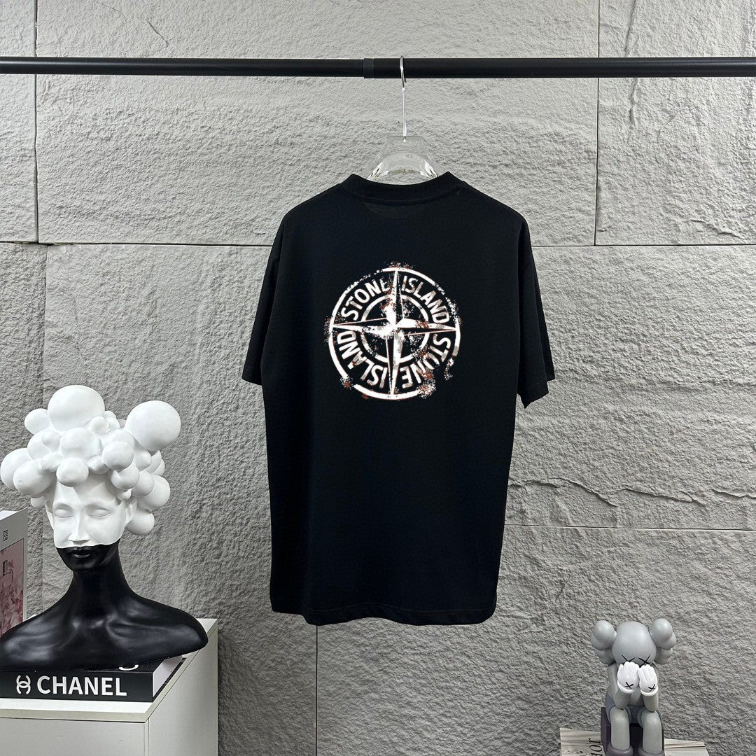 Stone Island Spring–Summer 2026 T-Shirt - Flame-Tipped Compass Star at Chest, Distressed Oversized Badge at Back
