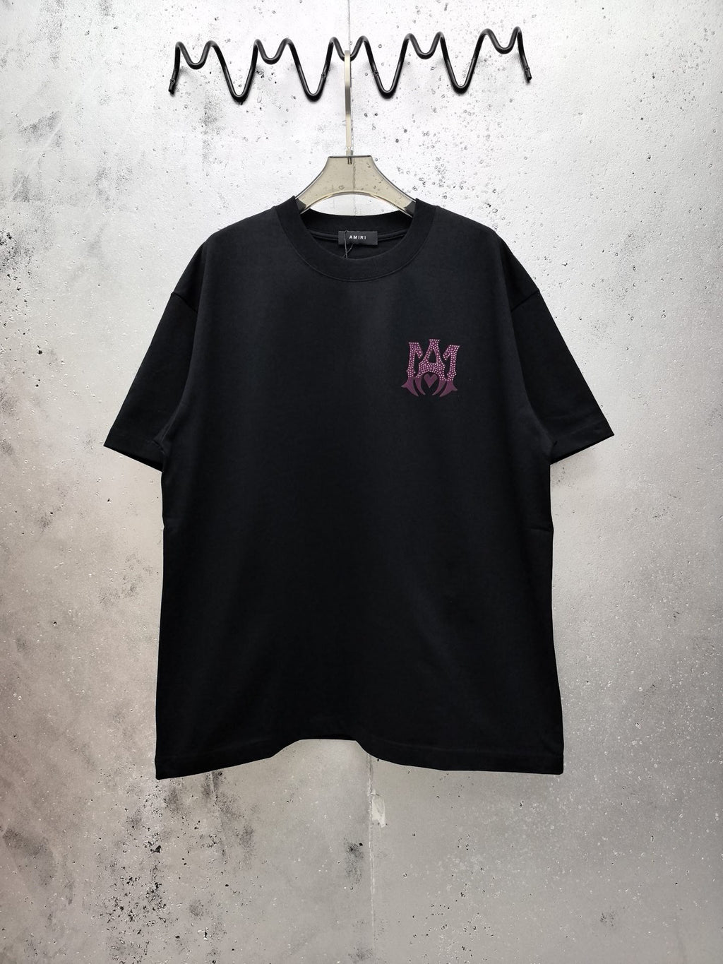 AMIRI Gothic Monogram Chest Graphic Crew Neck Short‑Sleeve T‑Shirt