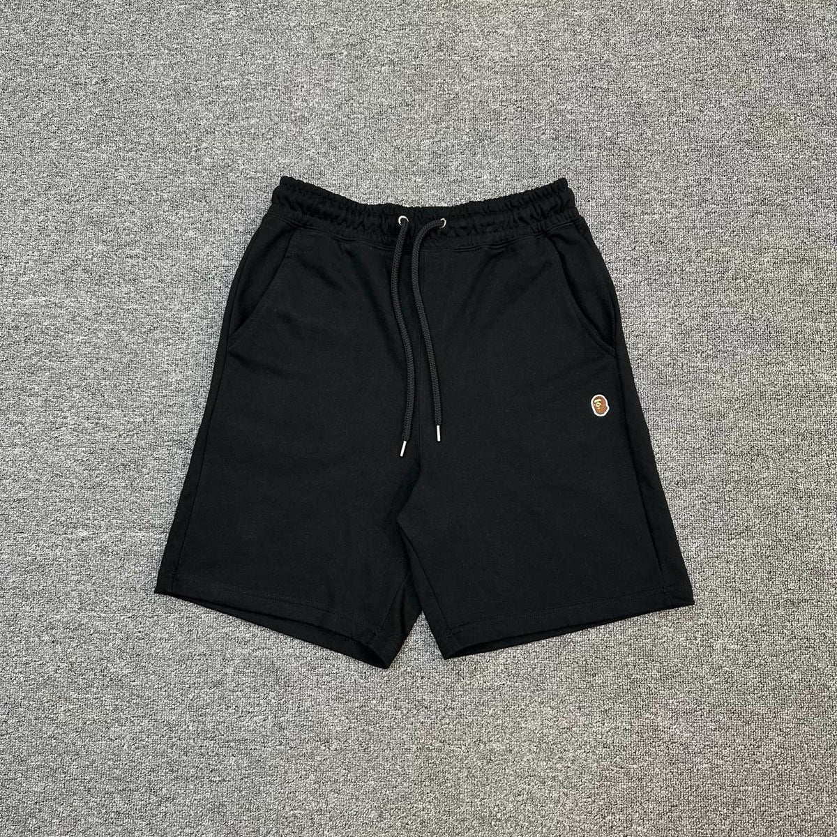 A Bathing Ape SS25 Gold Ape Head Woven Patch Shorts - Black