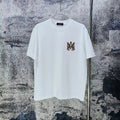 AMIRI Two‑Tone MA Monogram Chest Graphic Short‑Sleeve Tee
