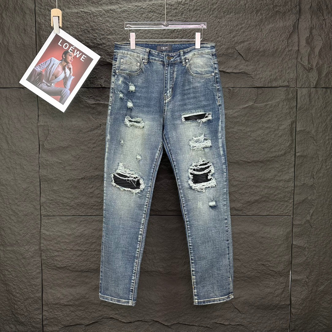 AMIRI Ripped Ribbed Patch Slim‑Fit Denim Jeans