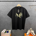 AMIRI Overlapping Stacked Letter Logo Crew Neck Short‑Sleeve T‑Shirt