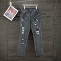 AMIRI Studded Multi‑Rip Distressed Slim‑Fit Denim Jeans