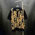 AMIRI All‑Over Letter Jacquard Short‑Sleeve Knit Polo Shirt