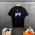 AMIRI Layered Metallic‑Effect Letter Graphic Short‑Sleeve Tee