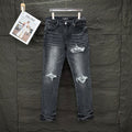 AMIRI White Ribbed Patch Distressed Slim‑Fit Denim Jeans