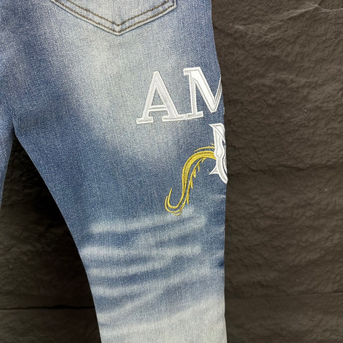AMIRI Yellow Patch Distressed Printed Slim‑Fit Denim Jeans