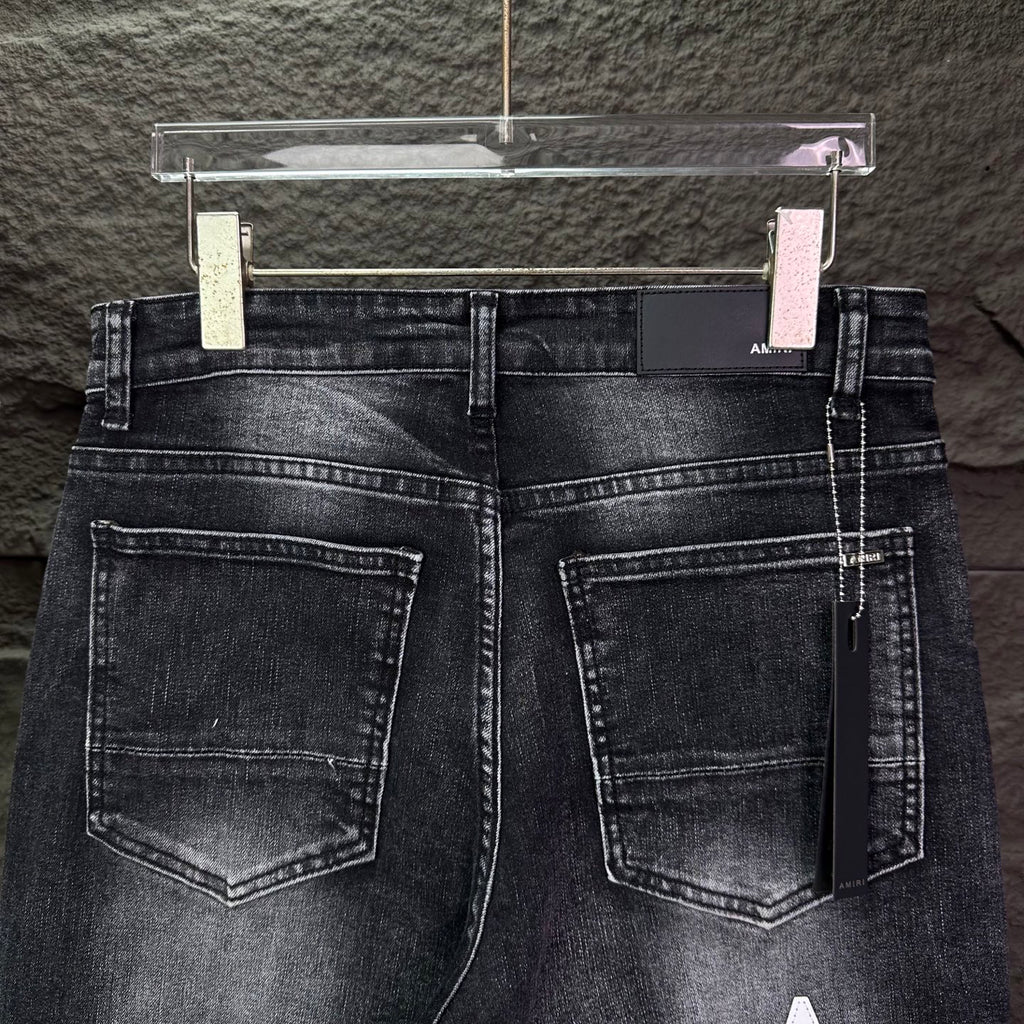 AMIRI Logo‑Print Multi‑Rip Distressed Slim‑Fit Denim Jeans