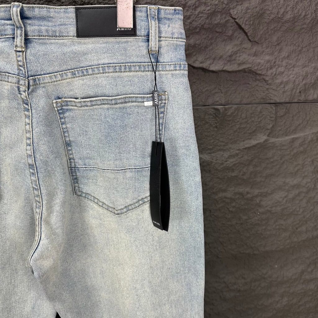 AMIRI Blue Ribbed Patch Diamond‑Rip Distressed Slim‑Fit Denim Jeans