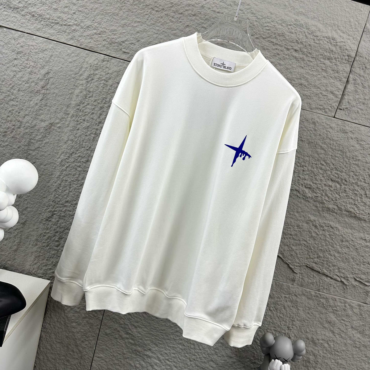Stone Island Early Autumn–Winter 2026 Sweatshirt — Dripping Compass Star Flocked Logo at Left Chest, Dripping Compass Badge at Centre Back