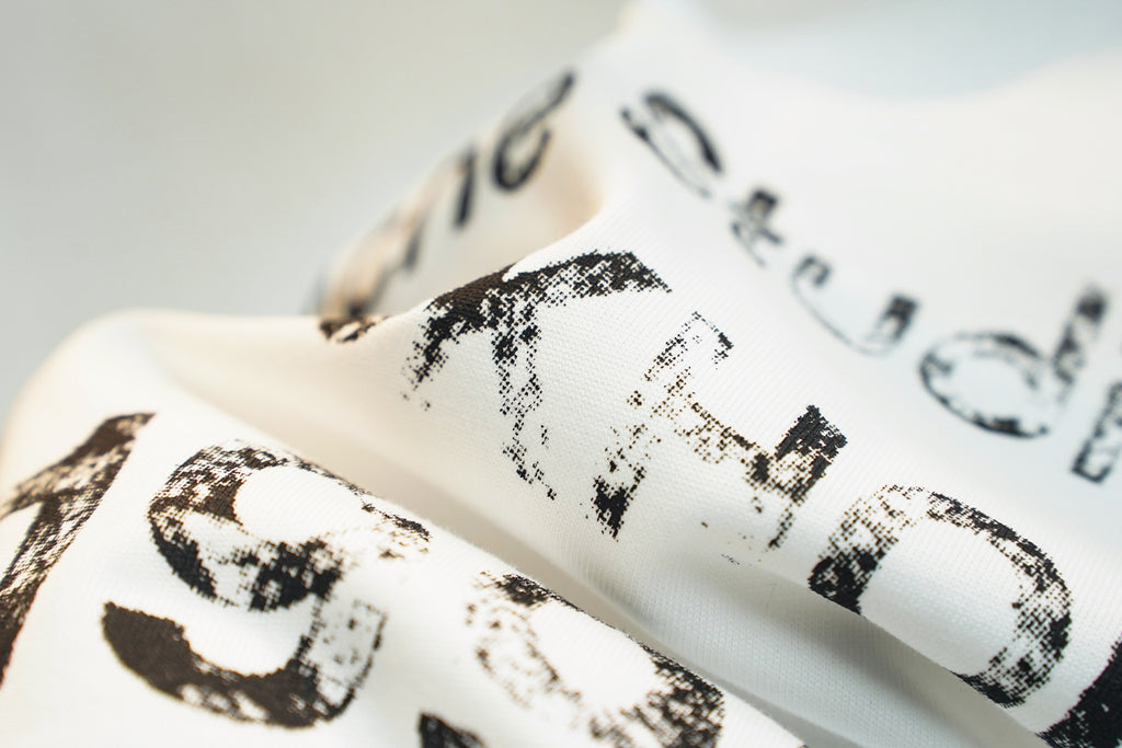 Acne Studios Stockholm 1996 Distressed Text‑Print Crew‑Neck Short‑Sleeve T‑Shirt