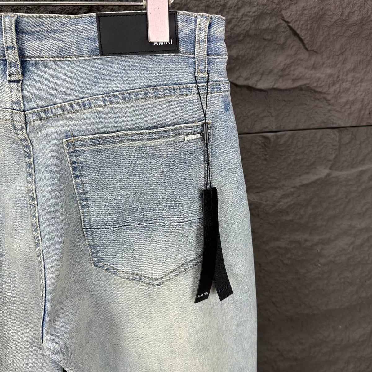 AMIRI Black Ribbed Patch Distressed Slim‑Fit Denim Jeans