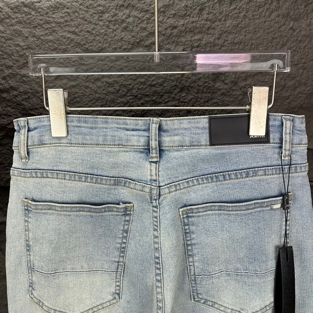 AMIRI White Ribbed Patch Distressed Slim‑Fit Denim Jeans