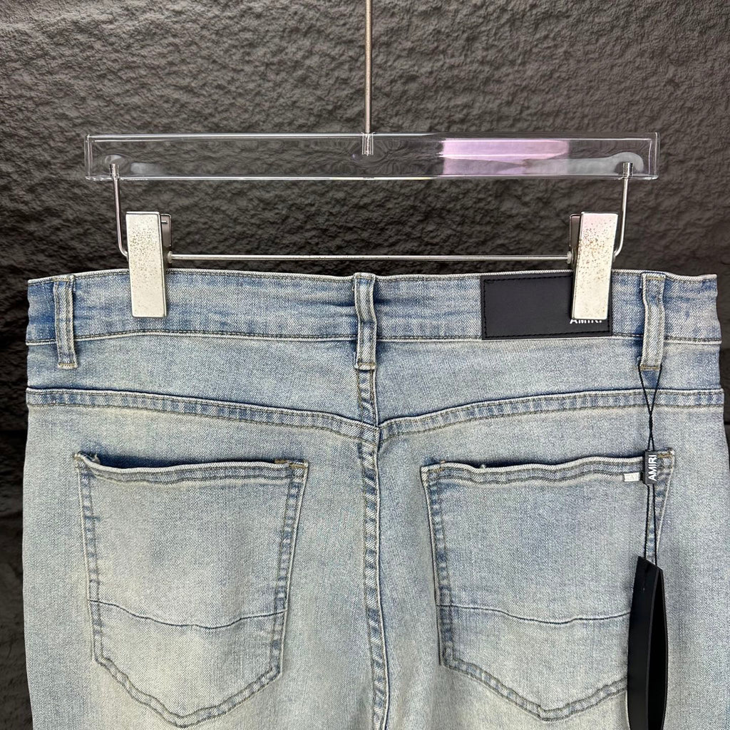AMIRI Blue Ribbed Patch Diamond‑Rip Distressed Slim‑Fit Denim Jeans