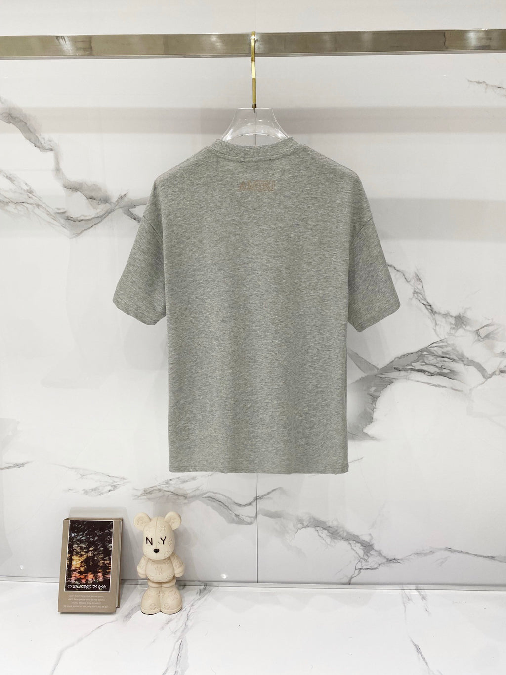 AMIRI Chest Pocket Subtle Embossed Graphic Crew Neck Short‑Sleeve T‑Shirt