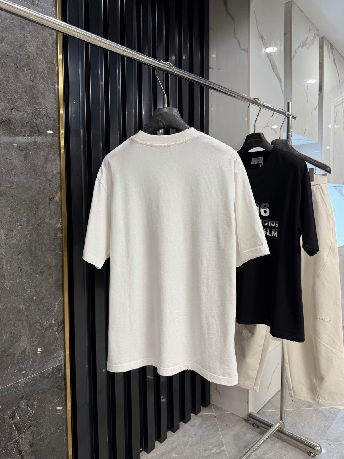 Acne Studios Stockholm 1996 Stacked‑Text Distressed‑Hem Oversized Crew‑Neck T‑Shirt