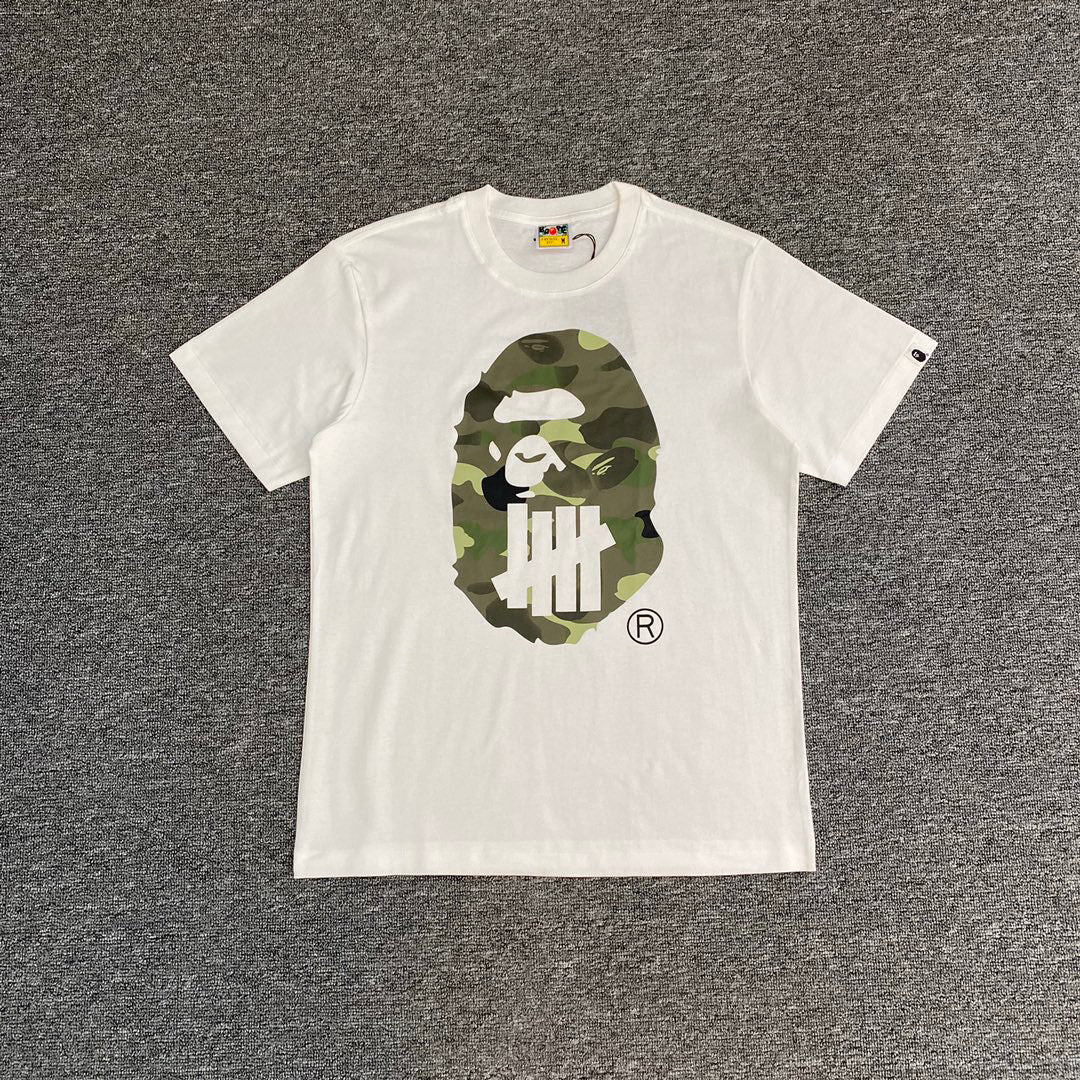 BAPE × UNDEFEATED Green Camo Ape Head Collab Oversized Unisex T-Shirt