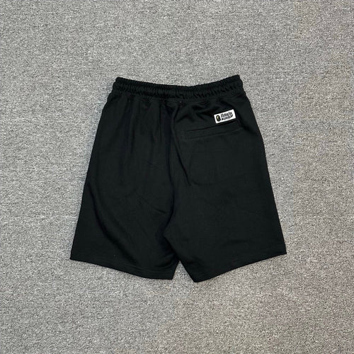 A Bathing Ape SS25 Gold Ape Head Woven Patch Shorts - Black