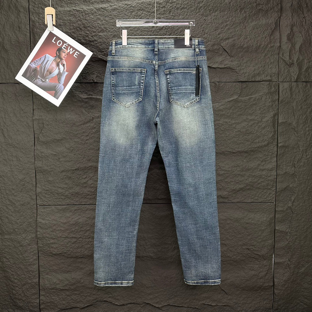 AMIRI Ripped Ribbed Patch Slim‑Fit Denim Jeans