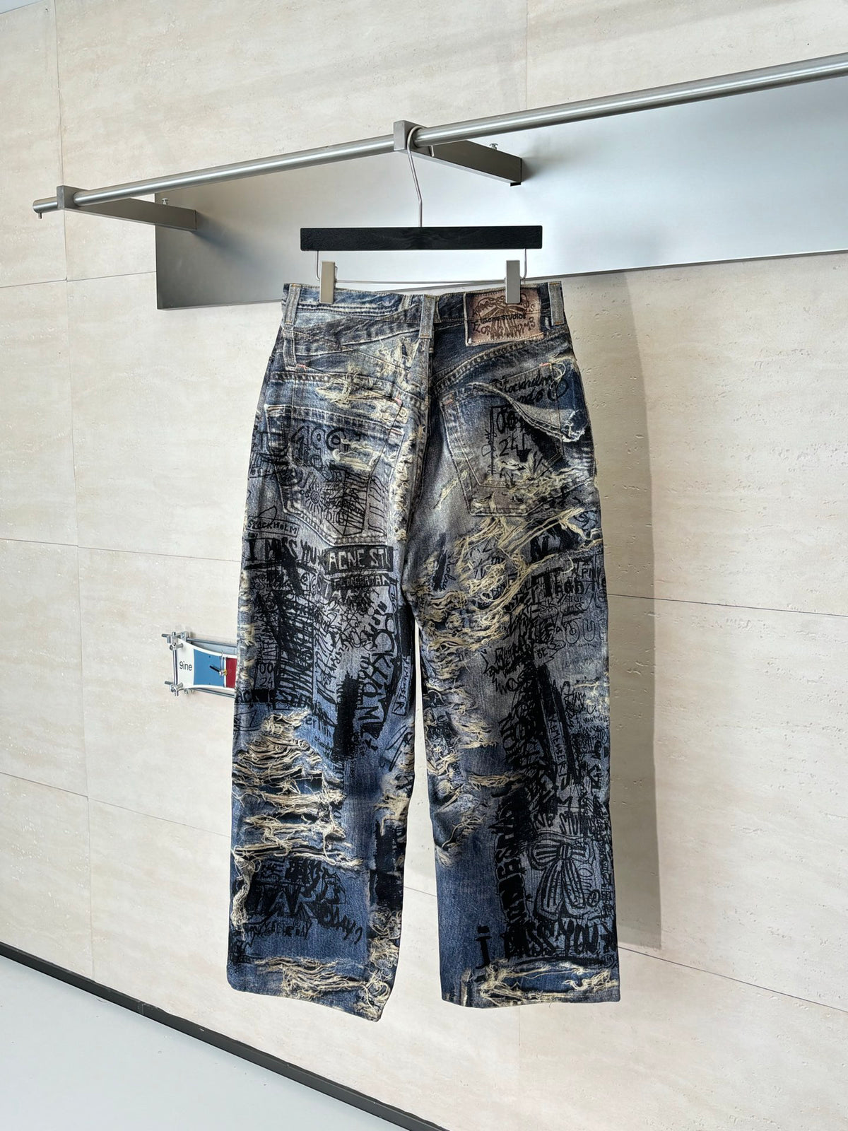 Acne Studios Graffiti‑Print Distressed Wide‑Leg Jeans