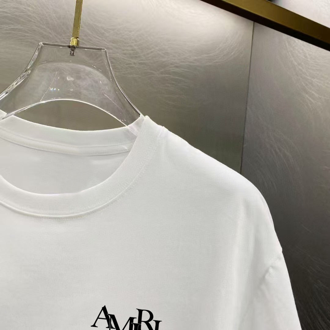 Amiri Interlocking Monogram Chest Graphic Crew‑Neck Short‑Sleeve T‑Shirt