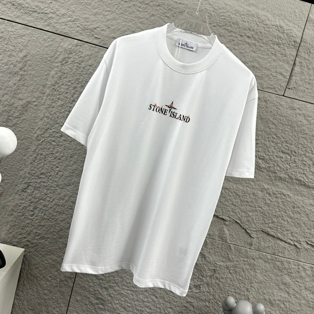 Stone Island Spring–Summer 2026 T-Shirt - Flame-Tipped Compass Star at Chest, Distressed Oversized Badge at Back