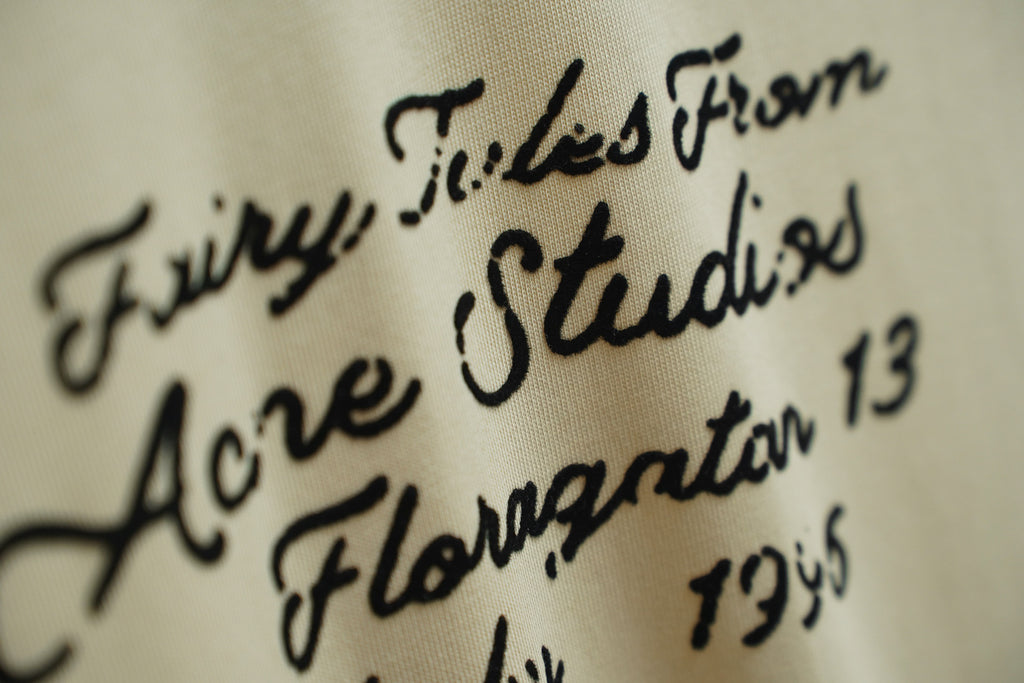 Acne Studios Fairy Tales Text‑Print Crew‑Neck Short‑Sleeve T‑Shirt