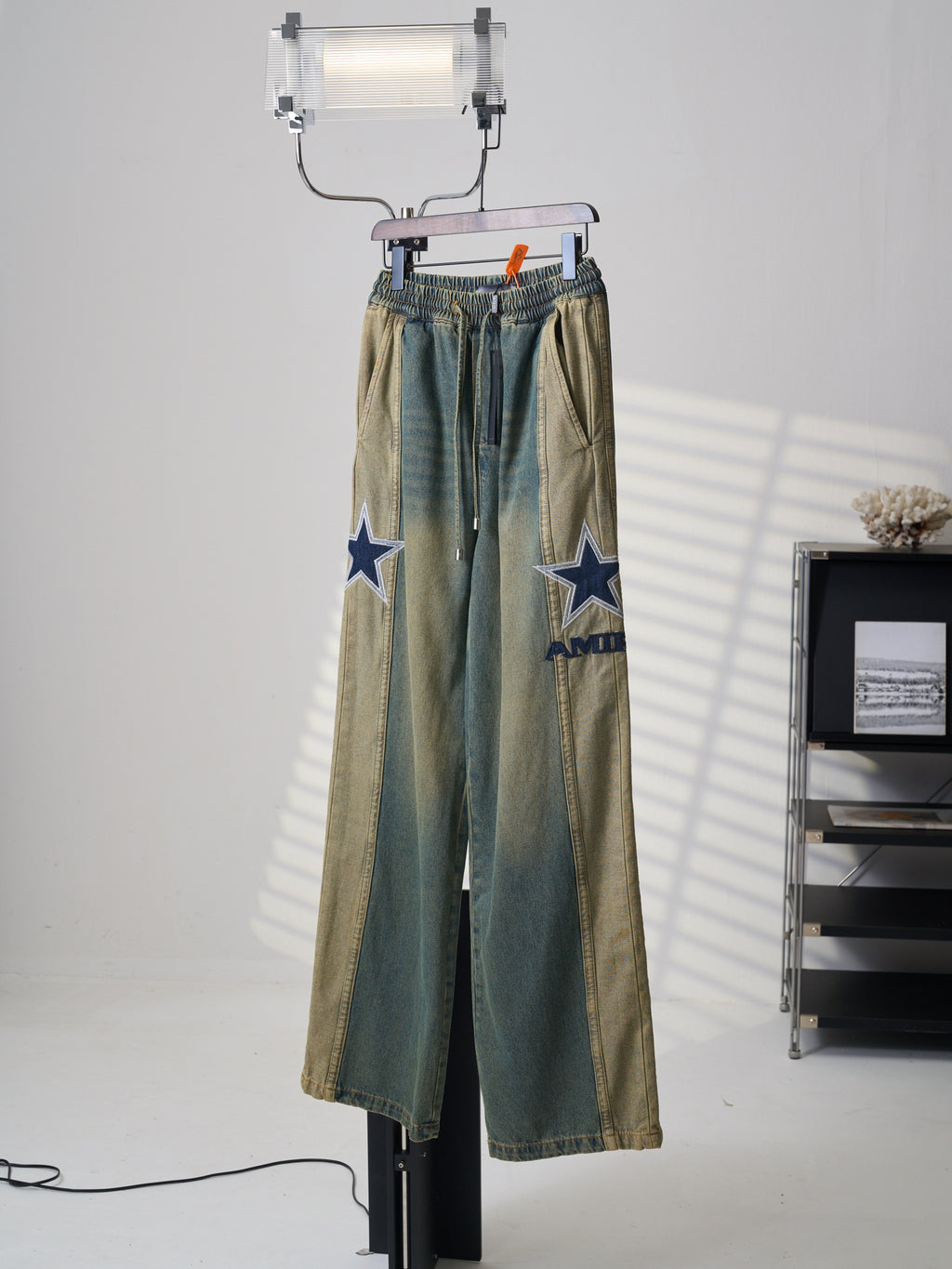 AMIRI Star‑Patch Paneled Drawstring Denim Pants