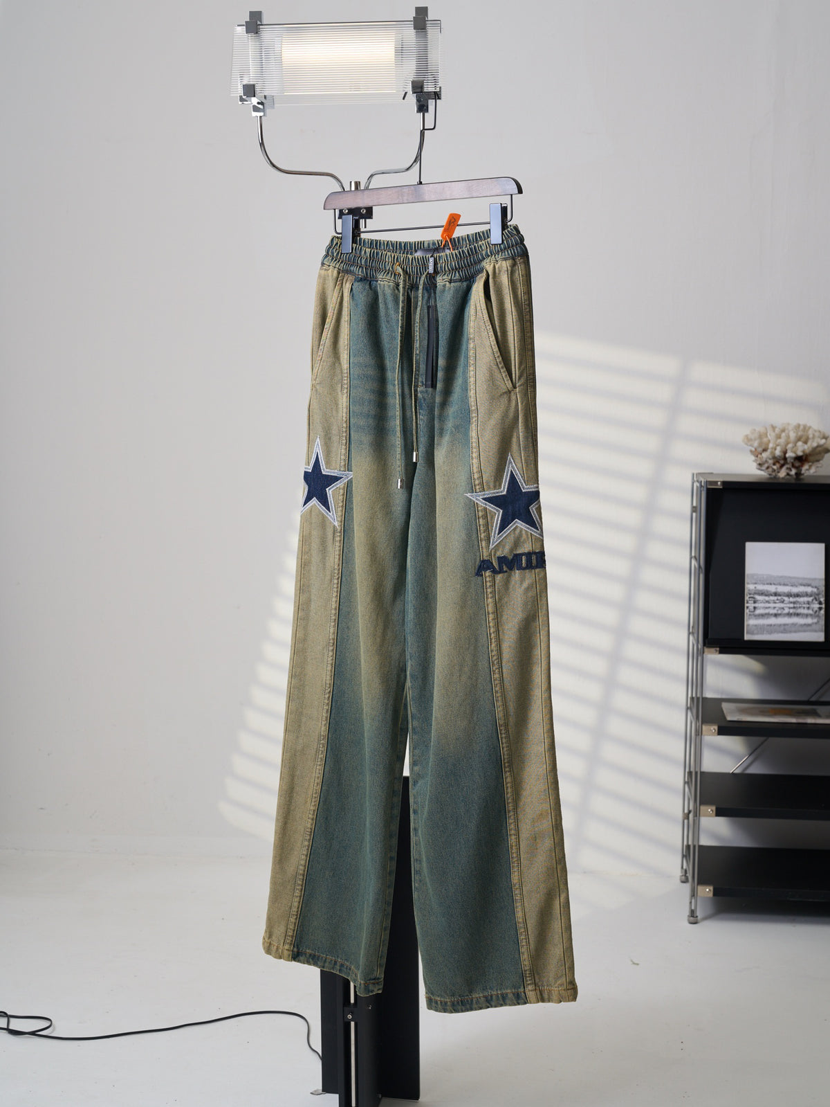 AMIRI Star‑Patch Paneled Drawstring Denim Pants
