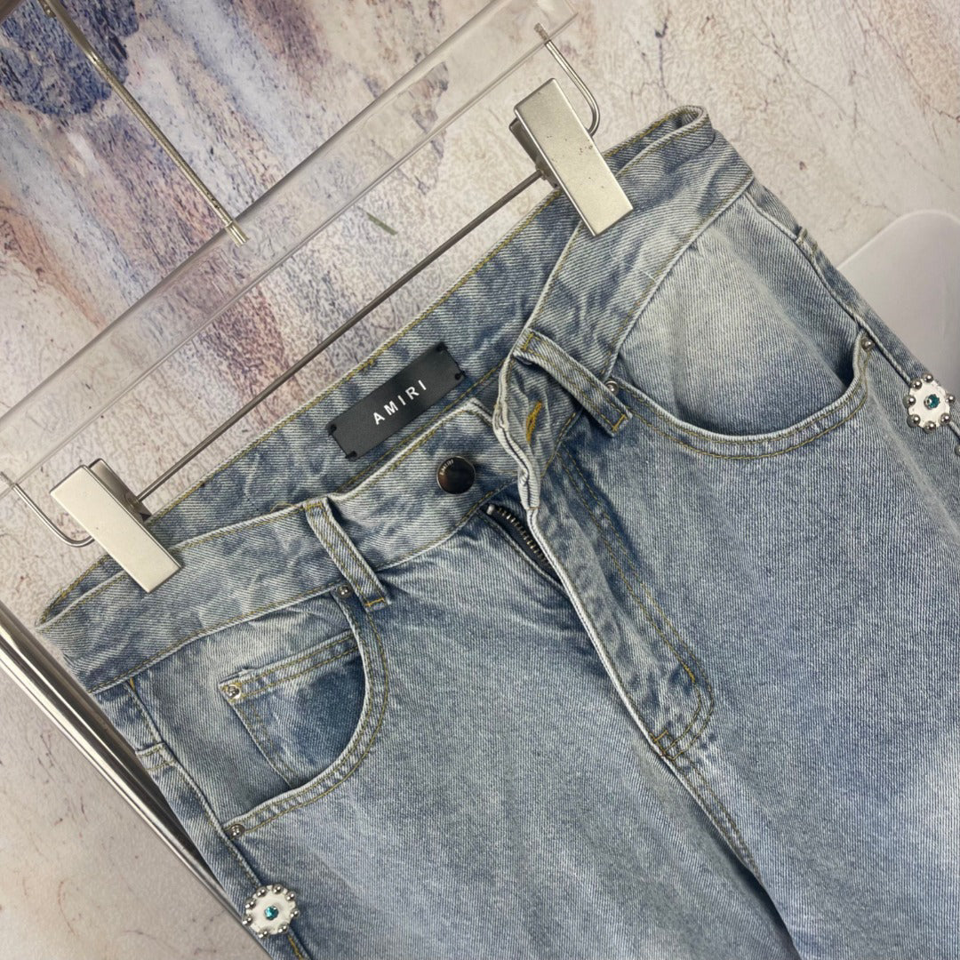 AMIRI Ornamental Stud Embellished Light‑Wash Flared Denim Jeans
