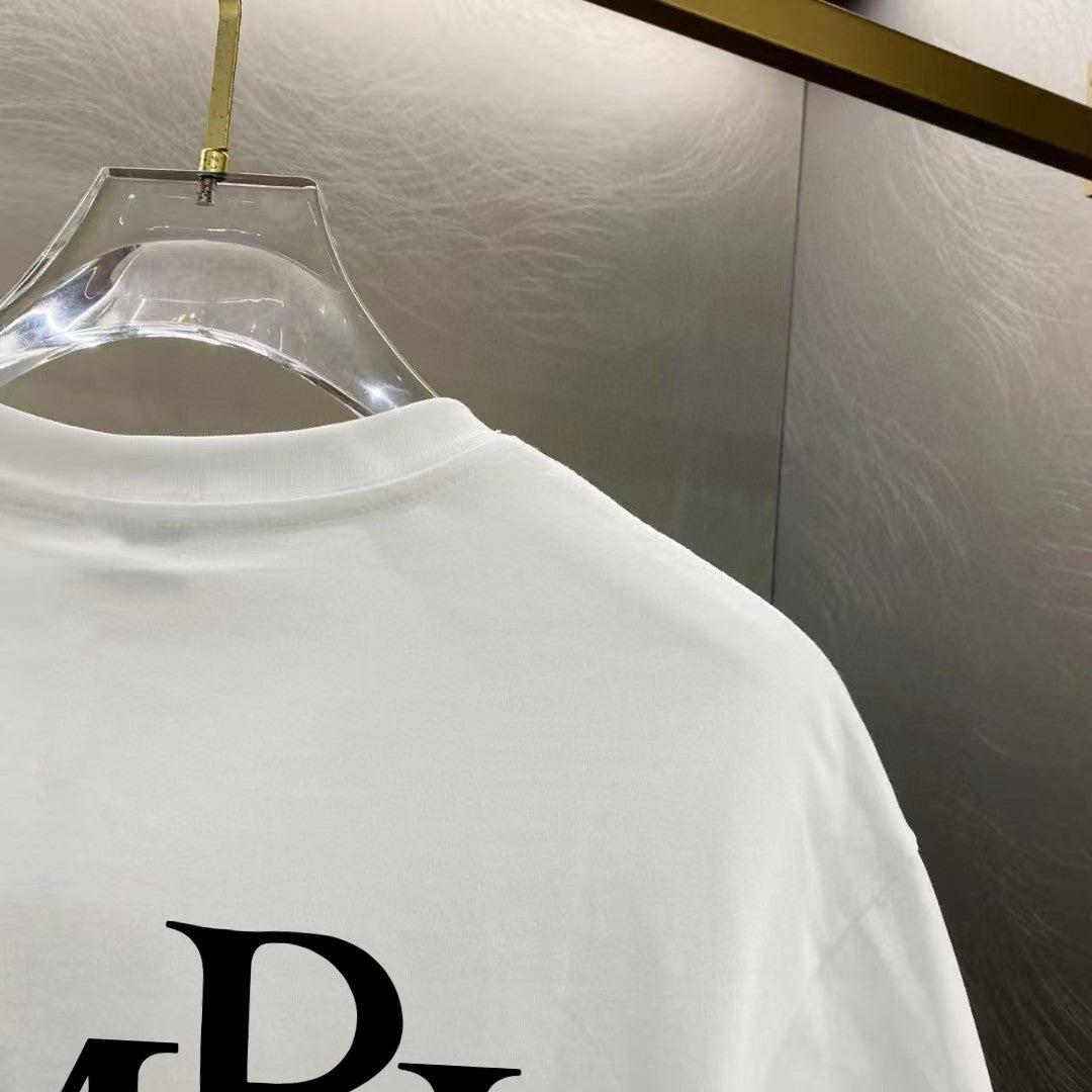 Amiri Interlocking Monogram Chest Graphic Crew‑Neck Short‑Sleeve T‑Shirt