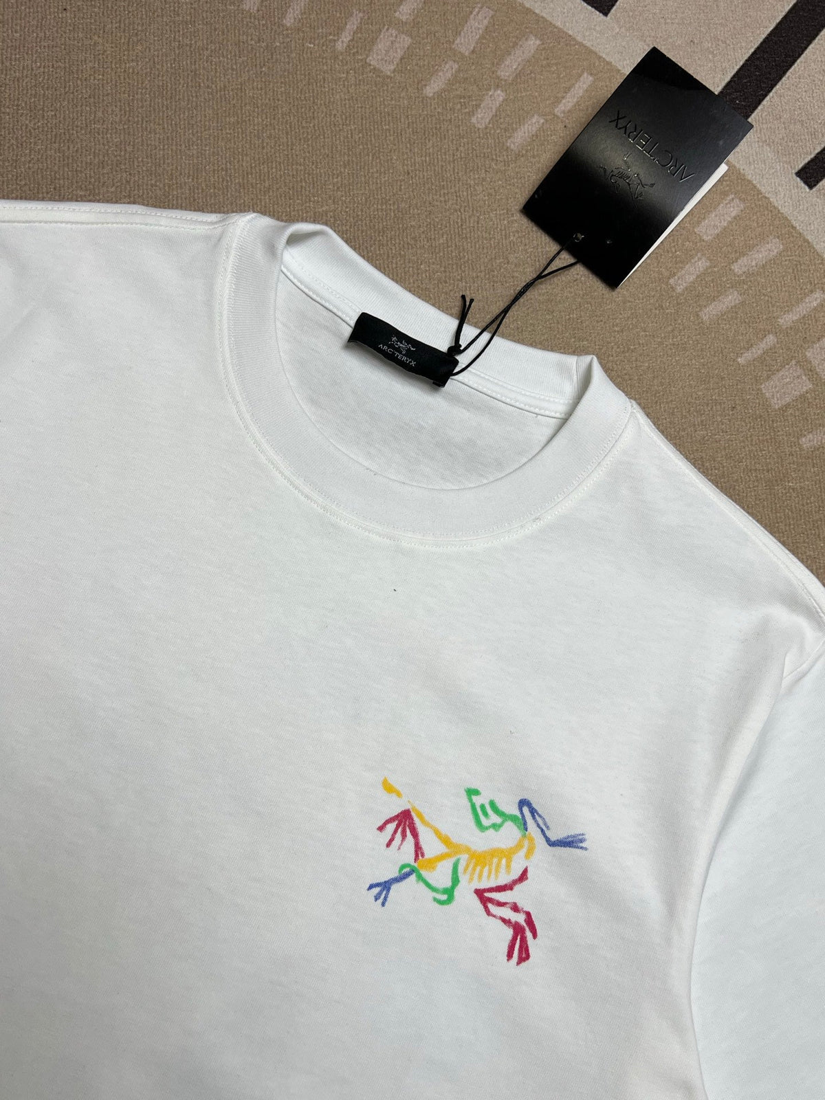 Arc'teryx Small Chest Multi‑Color Bird Logo Short‑Sleeve T‑Shirt Unisex