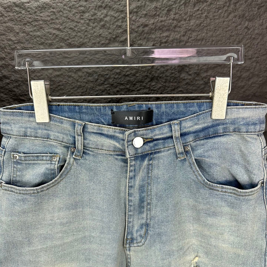 AMIRI Black Ribbed Patch Distressed Slim‑Fit Denim Jeans