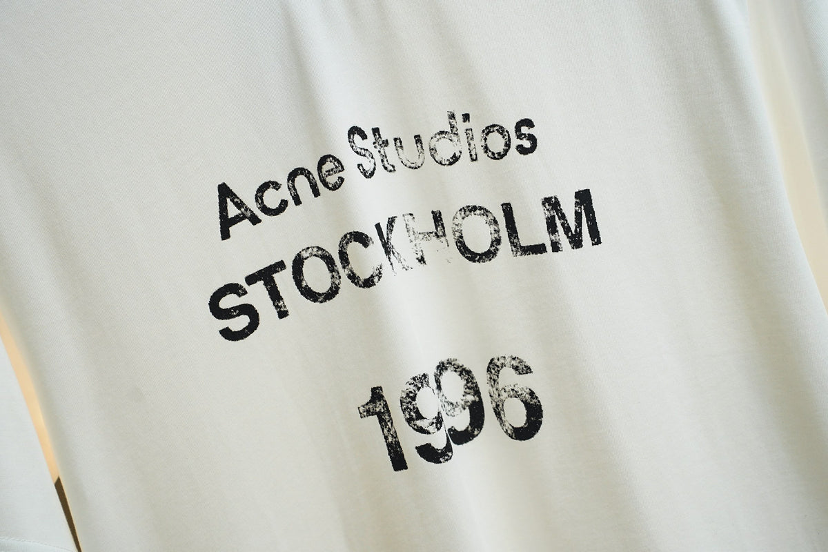 Acne Studios Stockholm 1996 Distressed Text‑Print Crew‑Neck Short‑Sleeve T‑Shirt