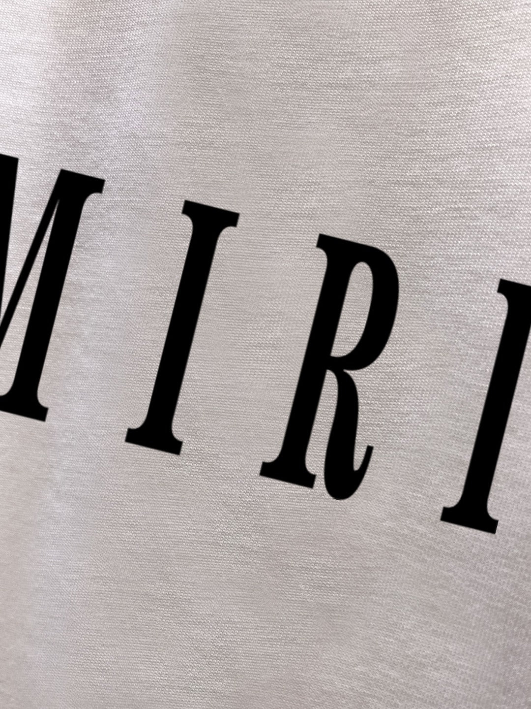 AMIRI Serif Logo Graphic Long‑Sleeve Tee