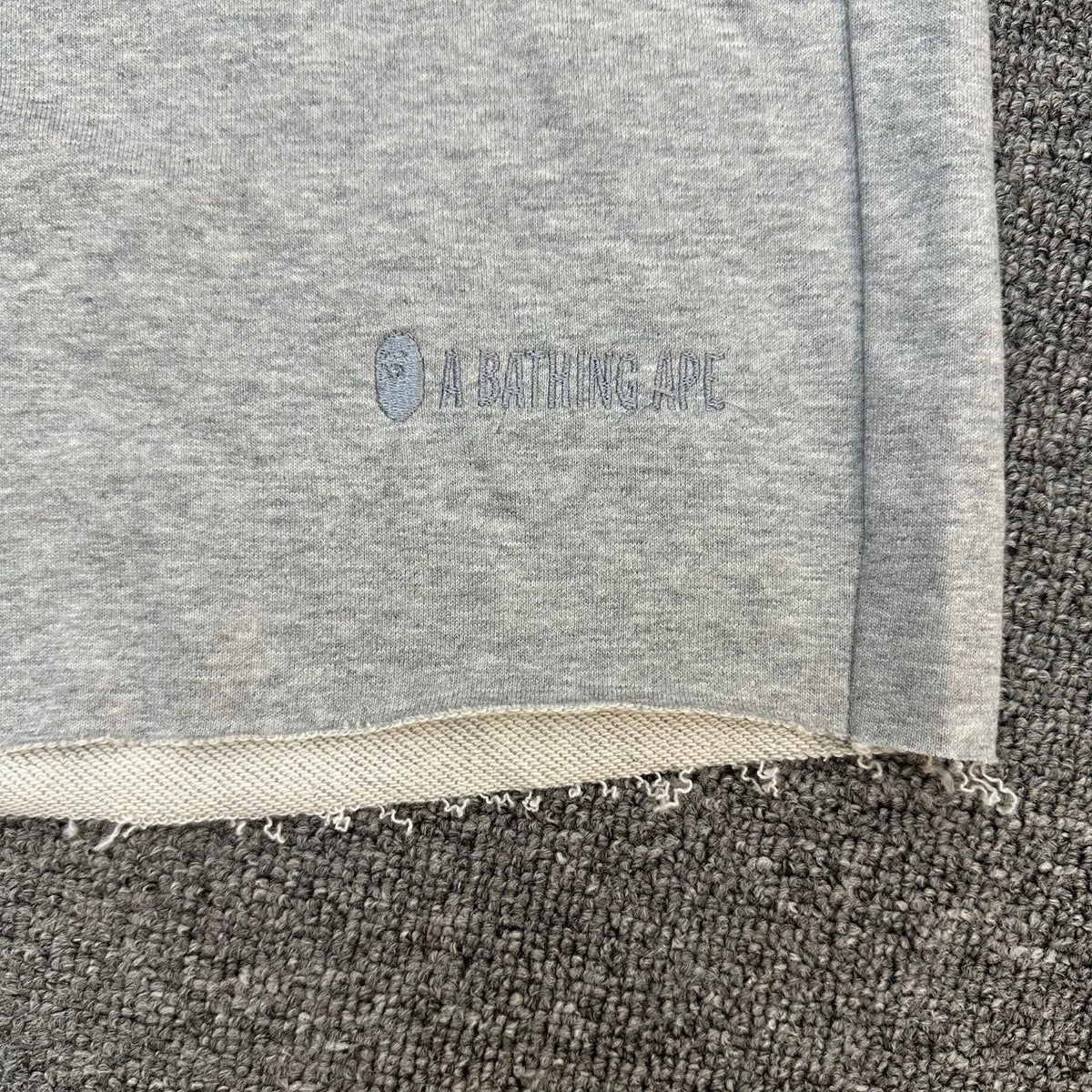 A Bathing Ape Wordmark Embroidered Raw Hem Shorts - Black / Gray