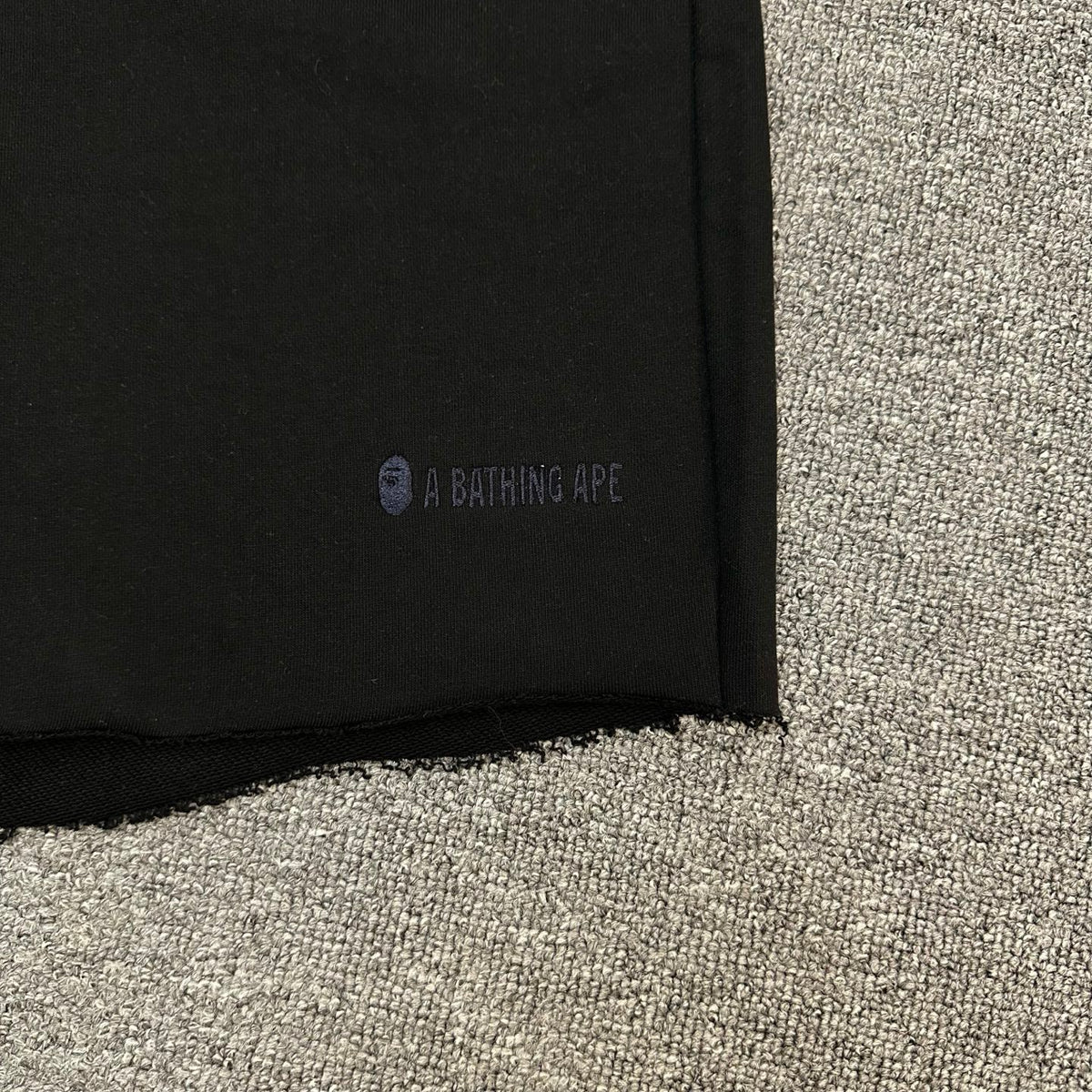 A Bathing Ape Wordmark Embroidered Raw Hem Shorts - Black / Gray