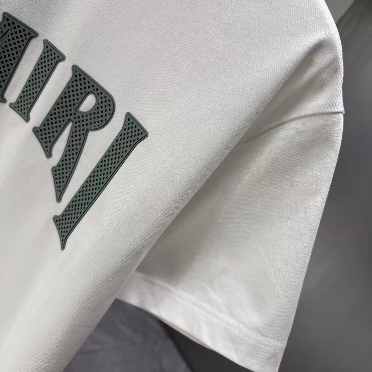 AMIRI Perforated Collegiate Logo Crew‑Neck Short‑Sleeve T‑Shirt