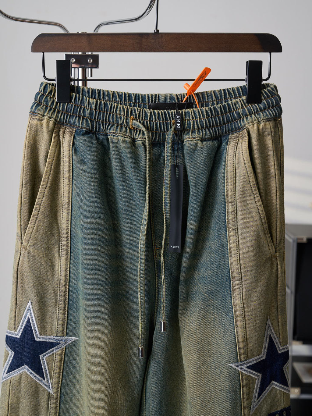 AMIRI Star‑Patch Paneled Drawstring Denim Pants