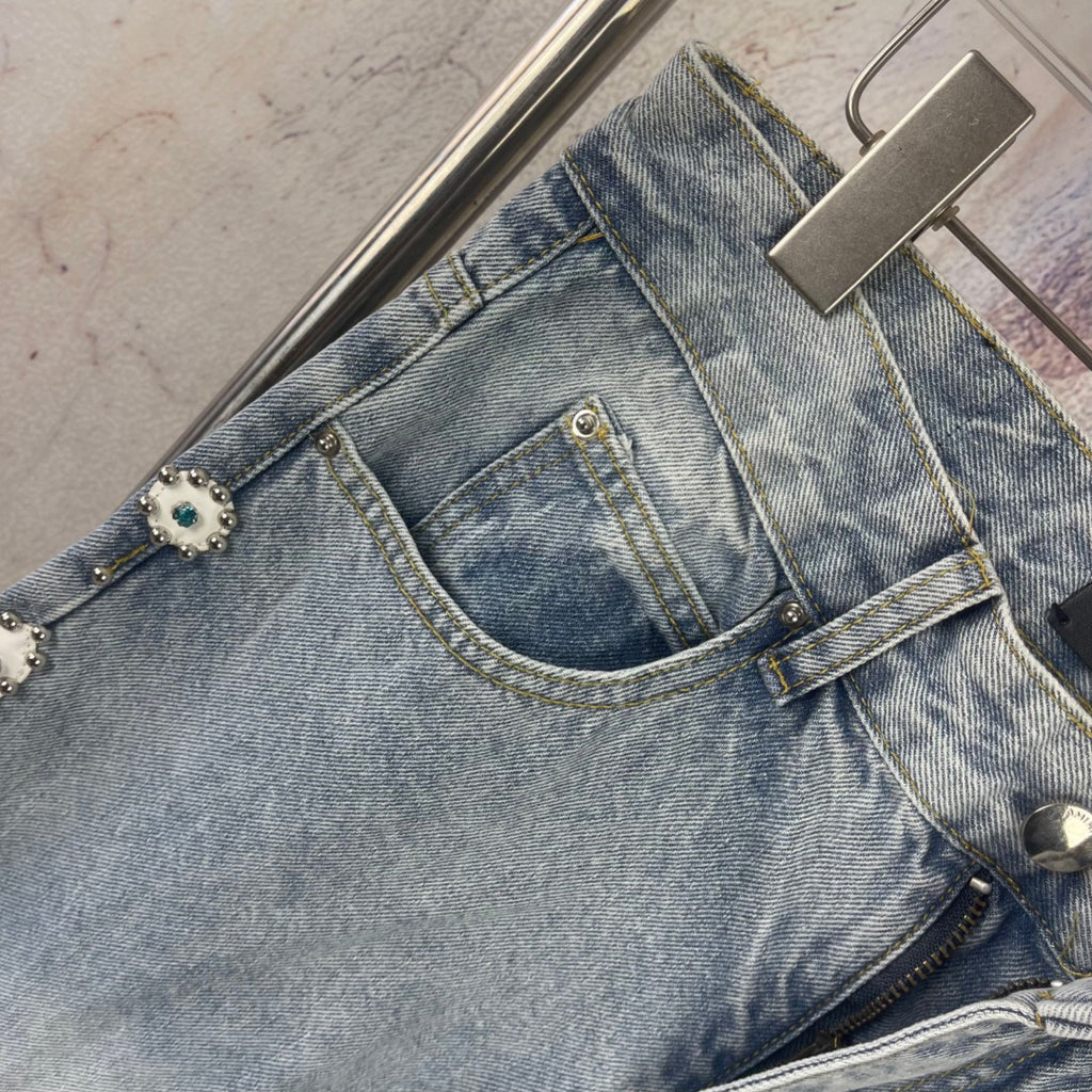 AMIRI Ornamental Stud Embellished Light‑Wash Flared Denim Jeans