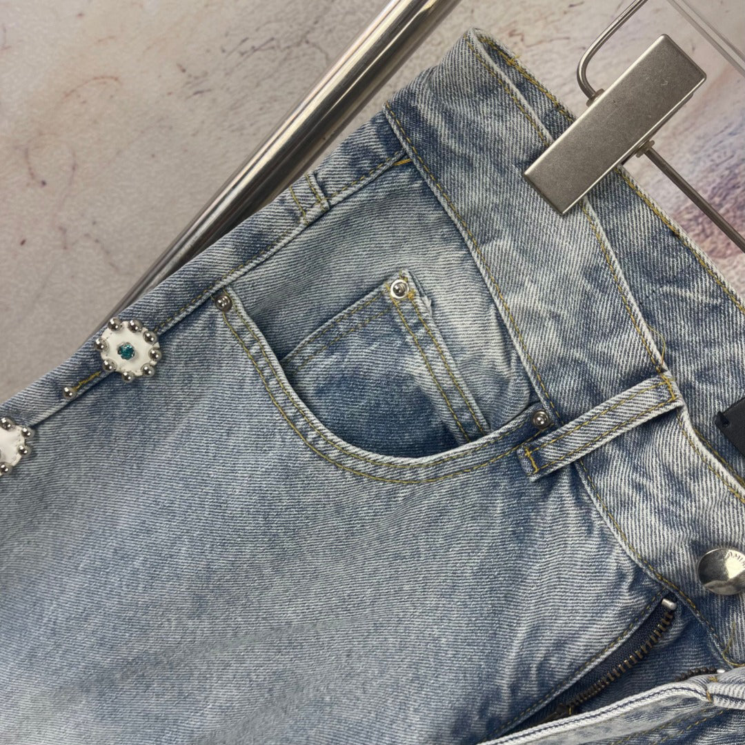 AMIRI Ornamental Stud Embellished Light‑Wash Flared Denim Jeans