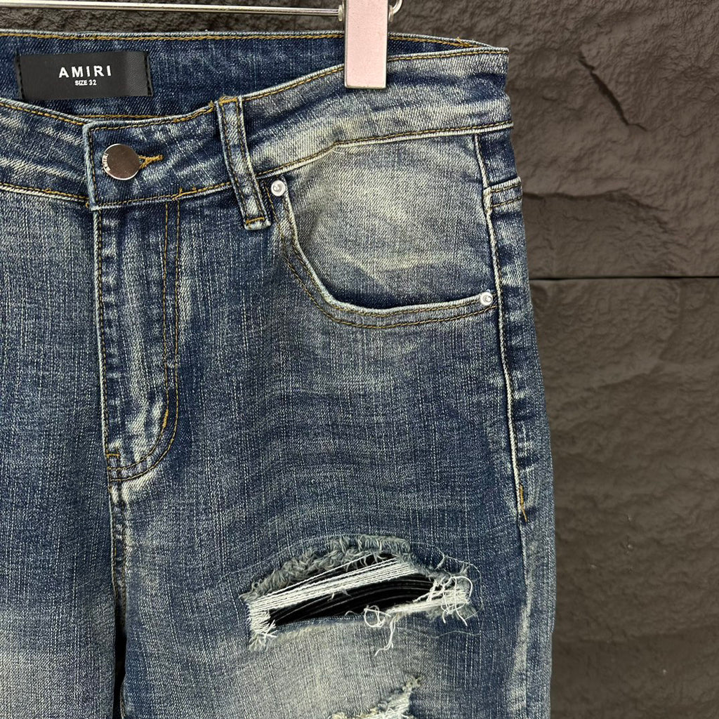 AMIRI Ripped Ribbed Patch Slim‑Fit Denim Jeans