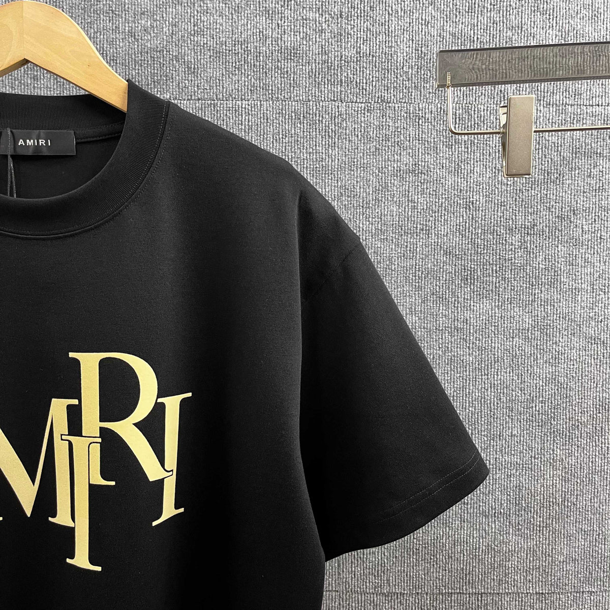 AMIRI Overlapping Stacked Letter Logo Crew Neck Short‑Sleeve T‑Shirt