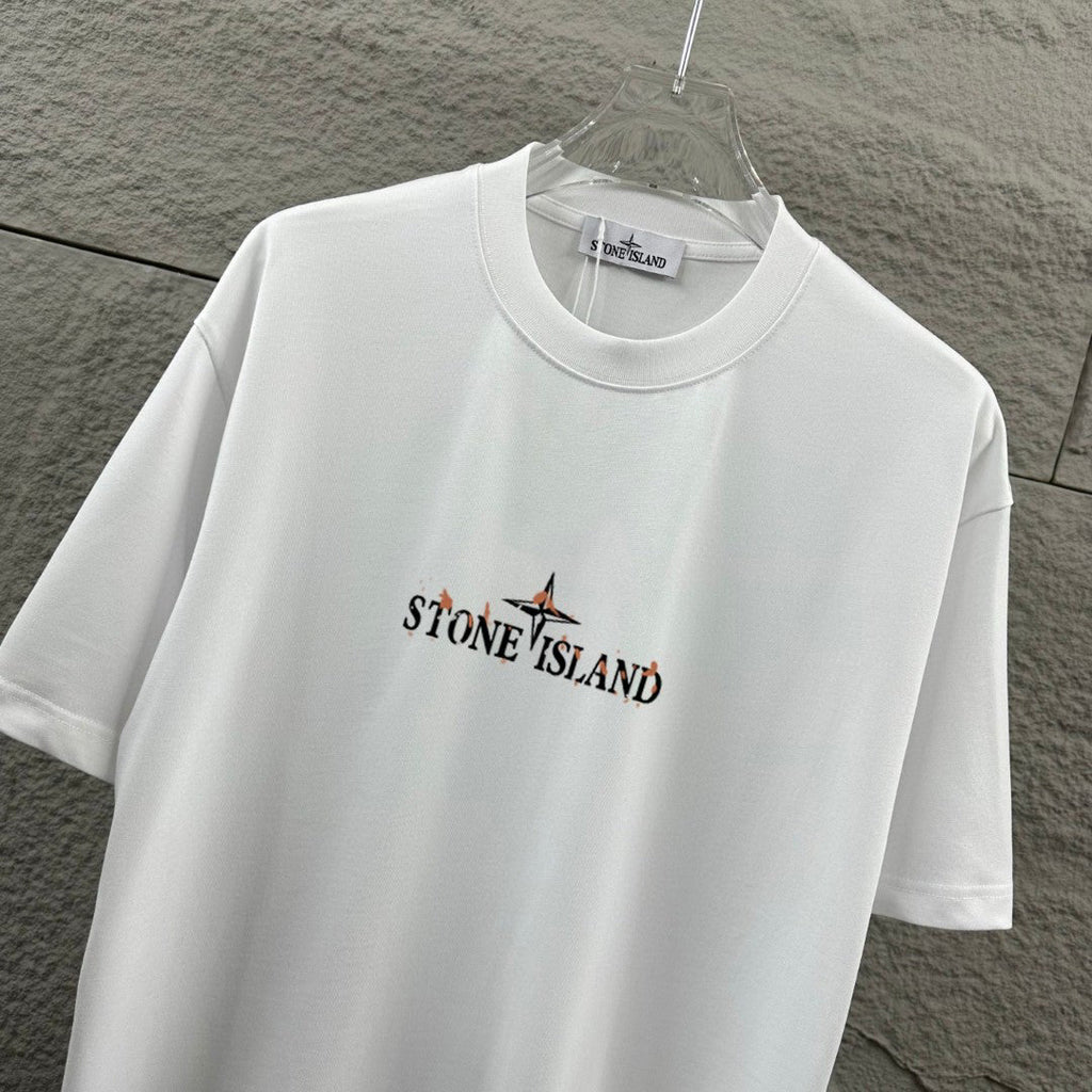 Stone Island Spring–Summer 2026 T-Shirt - Flame-Tipped Compass Star at Chest, Distressed Oversized Badge at Back