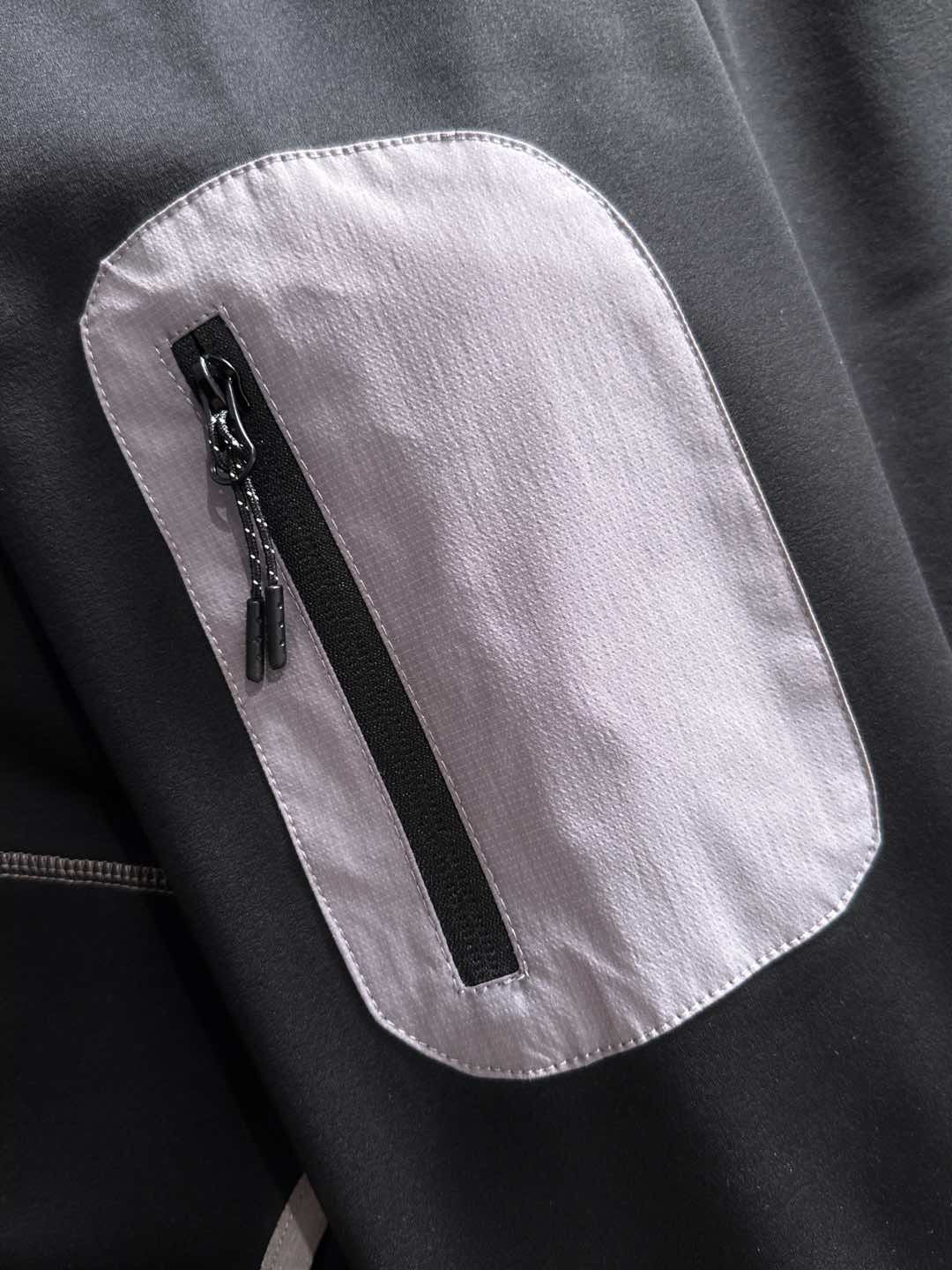 Arc'teryx LEAF Lion Crest Embroidered Softshell Hooded Jacket