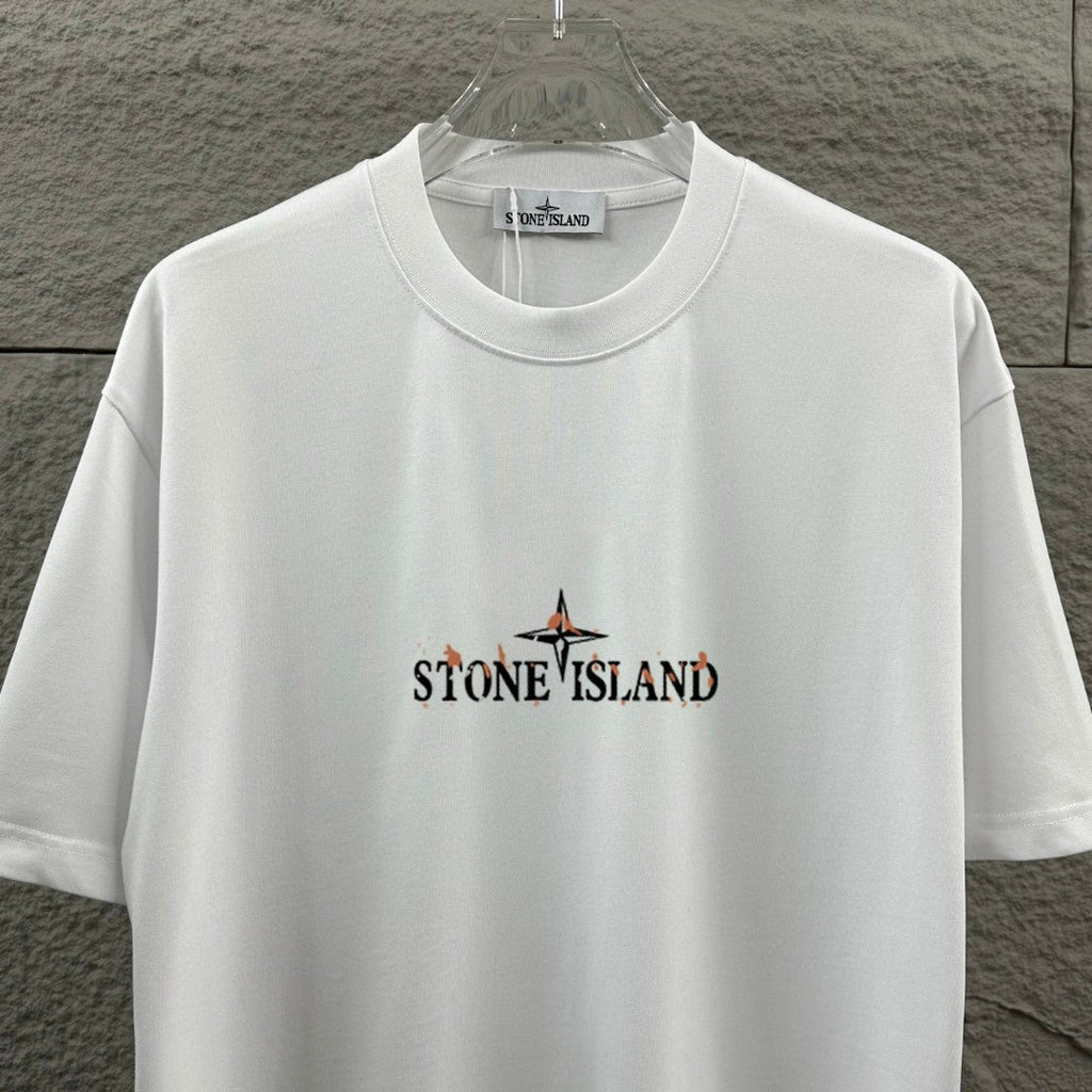 Stone Island Spring–Summer 2026 T-Shirt - Flame-Tipped Compass Star at Chest, Distressed Oversized Badge at Back